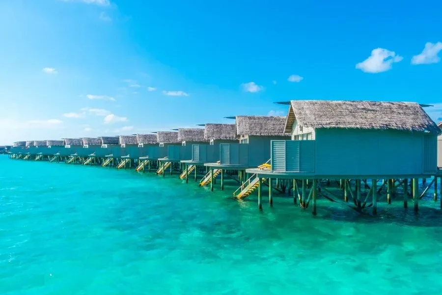 water-villas-calm-sea-tropical-maldives-island